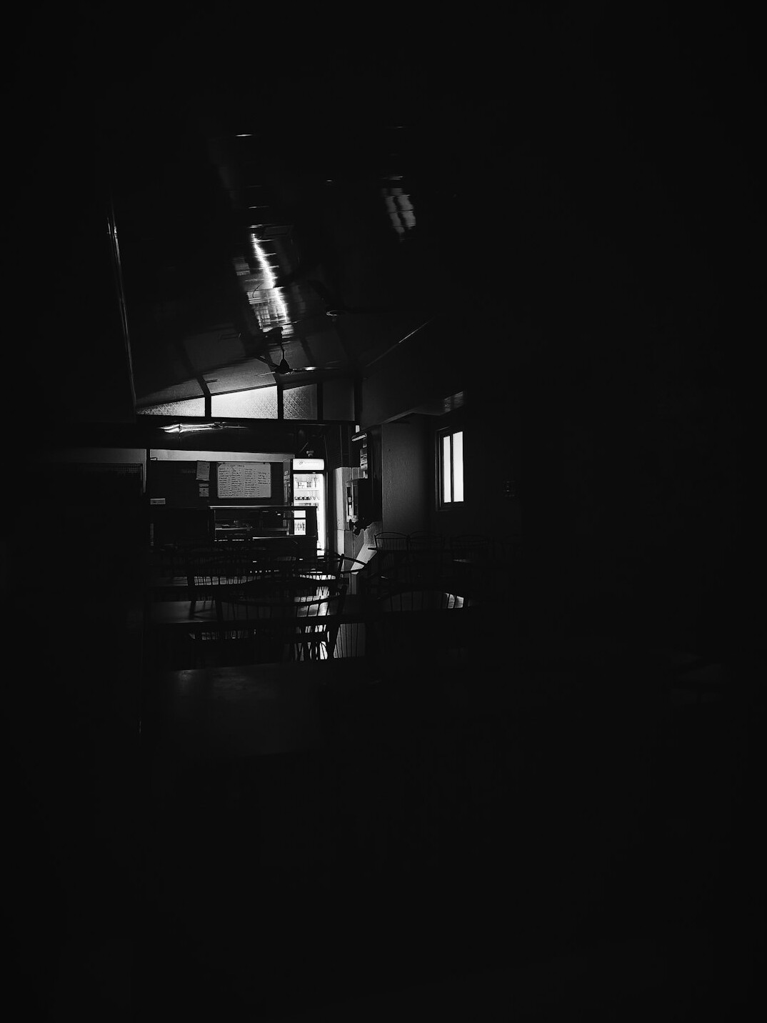 Vintage cathode-ray television set glowing in a dim room
